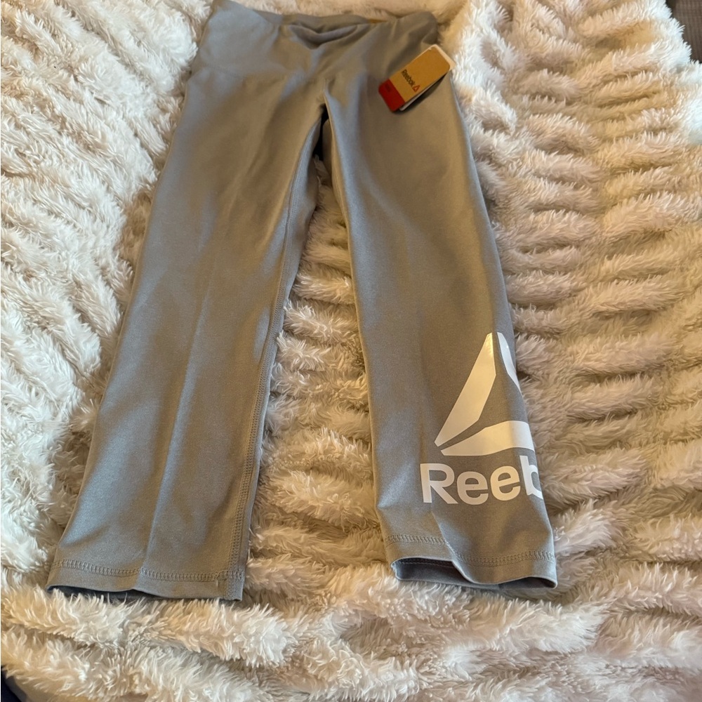 Reebok Women's Capris - Set of 4 1-Mint, 1-Silver, 1-Black and 1 black short. - Picture 6 of 14